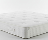 Detail van de doorsnede van een hybride matras van 160 x 200 cm met traagschuim met hoge dichtheid en pocketveren